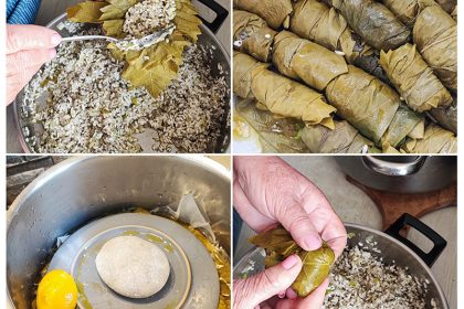 Χειροποίητα vegan ντολμαδάκια γιαλαντζί με αμπελόφυλλα, ρύζι και μυρωδικά κατά την προετοιμασία και το τύλιγμα. Traditional vegan dolmadakia with vine leaves, rice and fresh herbs during preparation in a cozy Greek kitchen.